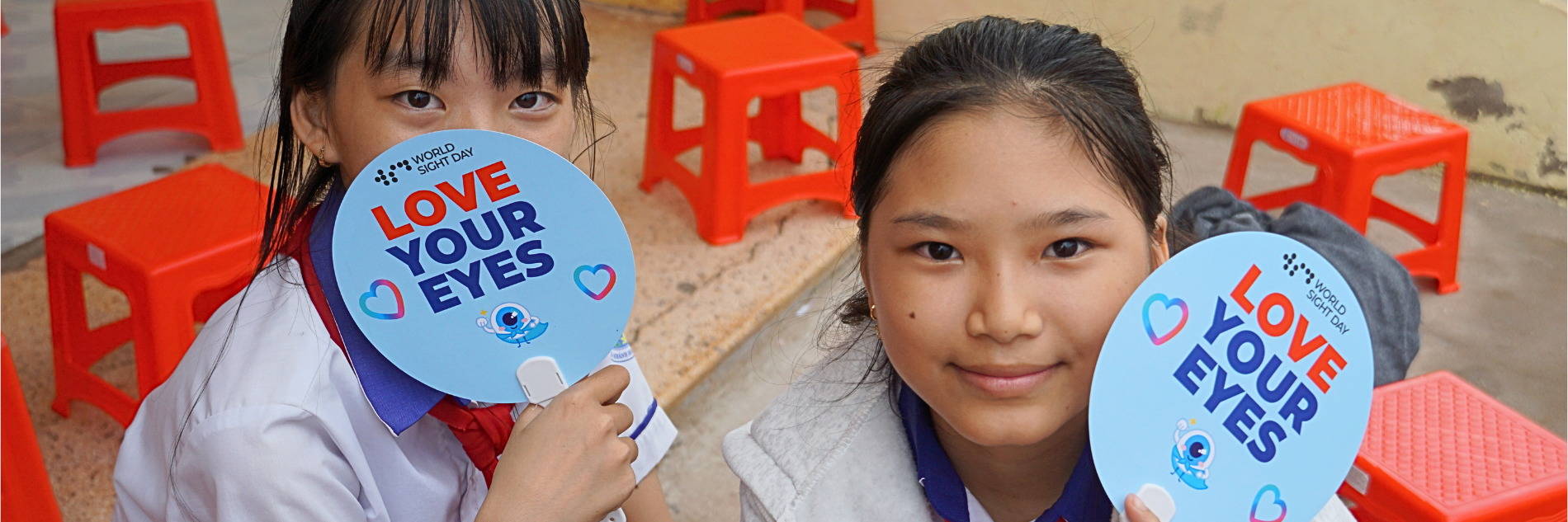Twee Vietnameese meisje op World Sight Day